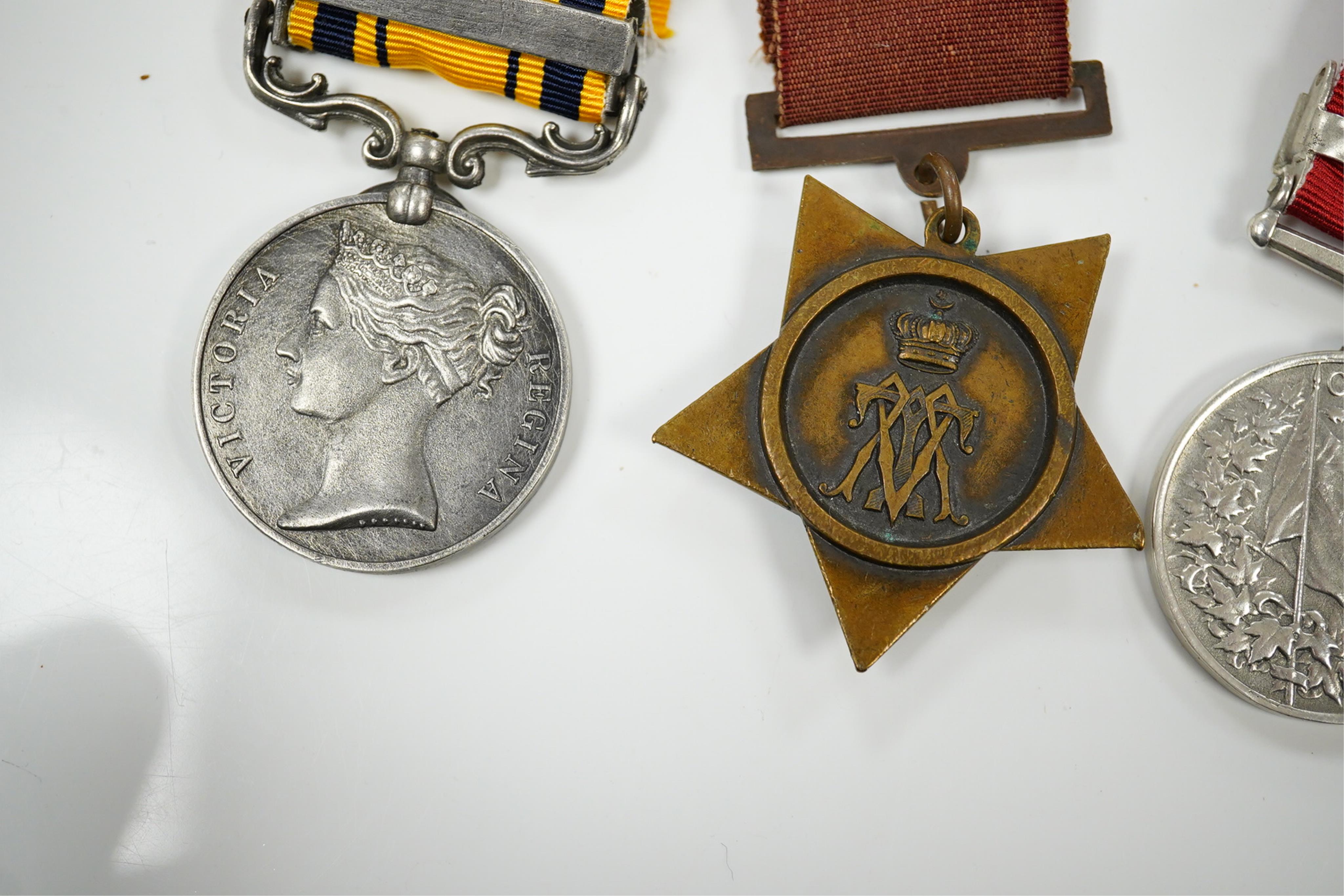 Five replica medals; Khedive's Star 1882, another undated with clasp and a third, 1884 lacking bar, Canada General Service with Fentan Raid 1866 clasp and South Africa medal with 1877-8-9 clasp and a spare 1877 clasp.